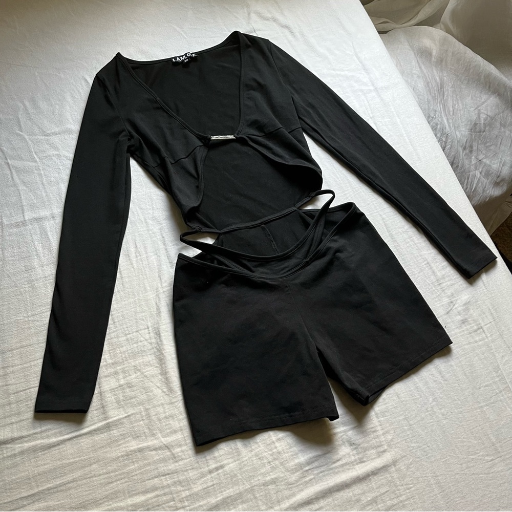 I AM GIA black cut out long sleeve knit romper